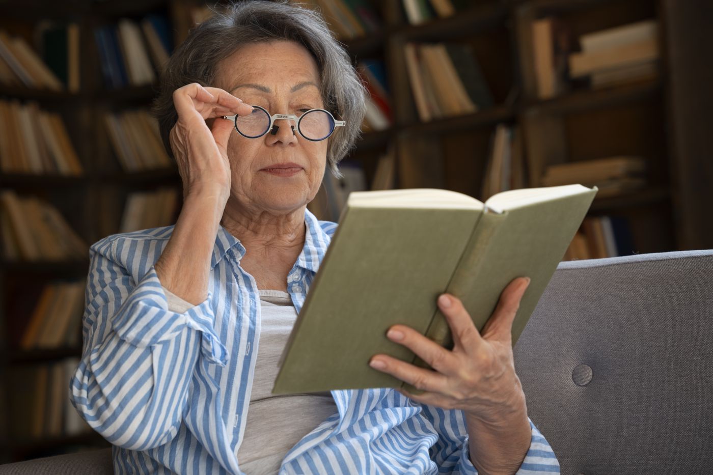medium shot old woman library